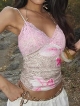Pink lace leopard cami with ruched bodice featuring floral accents and delicate lace detail in soft fabric