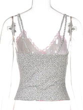 Gray leopard cami with delicate pink lace trim along neckline and straps featuring a ruched bodice detail