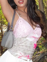 Gray shoulder bag with smooth leather-like finish complements lace detail leopard cami with ruched bodice style