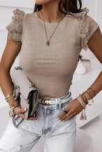 Round neck cap sleeve T-shirt with ribbed knit and lace ruffle shoulders