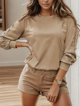 Tan round neck long sleeve T-shirt with lace detail and matching shorts