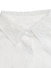 White lace detail ruffle sleeve button up shirt with delicate eyelet detailing and matching buttons on white lace collar