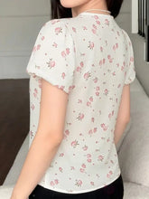 Lace detail short sleeve blouse in off-white flowing fabric with small pink roses and green leaves pattern