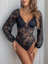 Black lace long sleeve bodysuit with corset-style front featuring elegant lace long sleeve design