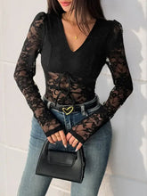 Black lace long sleeve bodysuit with v neck and tied waistband featuring lace long sleeve design and sleeve v neck detail