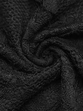 Black lace long sleeve v neck bodysuit featuring delicate intricate pattern and textured weave fabric