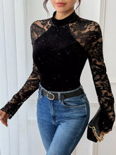 Black lace long-sleeved lace mock neck bodysuit with sparkling embellishments and high neckline