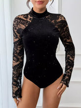 Black velvet lace mock neck bodysuit with long lace sleeves and subtle glitter detailing