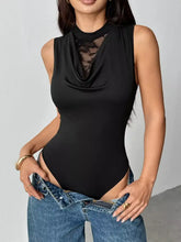 Black sleeveless high-neck bodysuit with sheer lace panel featuring a lace panel cowl neck design