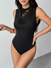 Black sleeveless one-piece swimsuit with lace panel cowl neck and sheer lace front panel detail
