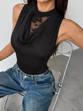 Black sleeveless bodysuit with high neckline and sheer lace panel featuring lace panel cowl neck design