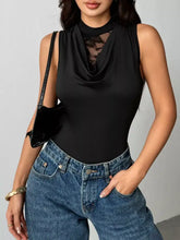 Black sleeveless bodysuit with lace panel cowl neck and sheer mesh panel at the neckline