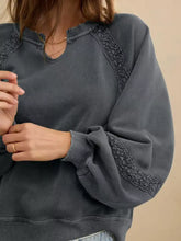 Dark gray mineral wash sweatshirt with delicate black lace trim on neckline and sleeves machine wash tumble dry low
