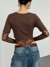 Brown lace patchwork round neck long-sleeve crop top with sheer mesh detailing on arms and back side view