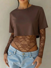 Brown lace patchwork round neck bodysuit with long-sleeve sheer floral fabric and cropped silhouette