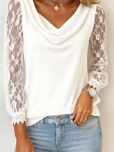 White lace sleeve cowl neck blouse featuring delicate lace sleeves and a soft cowl neck design