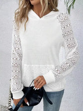 White lace sleeve kangaroo pocket hoodie with soft knit body, slightly stretchy fabric, and machine wash care instructions
