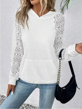 White lace sleeve kangaroo pocket hoodie with ribbed knit fabric, slightly stretchy, and machine wash care instructions