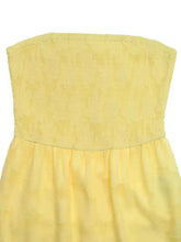 Lace smocked tube jumpsuit in yellow with textured bodice and flowing skirt, machine wash cold
