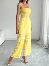 Vibrant yellow lace smocked tube jumpsuit with fitted bodice and wide-leg pants. Machine wash cold