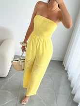 Lace smocked tube jumpsuit in vibrant yellow with textured bodice