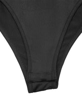 Black high-waisted bikini bottom with smooth stretchy fabric and neat stitching for lace sweetheart cap sleeve bodysuit look