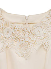 Cream-colored lace trim belted wide leg jumpsuit with white lace neckline
