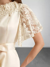 Cream-colored lace trim belted wide leg jumpsuit with floral lace sleeves