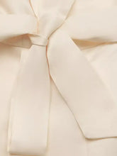 Cream-colored satin bow on lace trim belted wide leg jumpsuit