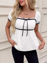 White lace trim bowknot short sleeve blouse featuring off-the-shoulder design and black lace trim at the neckline