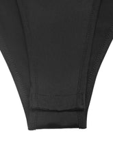 Black high-waisted bikini bottom with smooth stretchy fabric and neat stitching paired with lace trim shoulder bodysuit