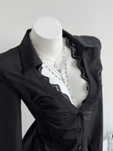 Black lace trim slim fit shirt with button down front and structured shoulders in delicate lace fabric