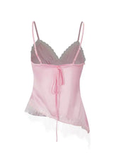 A delicate pink lace trimmed satin camisole with thin spaghetti straps and lace trim detailing