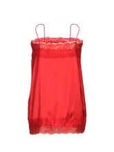 A vibrant red lace trimmed satin camisole with delicate lace trim along the neckline and hem
