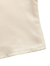 Cream-colored satin lace trimmed short sleeve blouse with smooth reflective fabric and neatly stitched hem