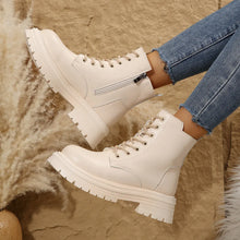 Cream-colored lace-up ankle boots featured in Lace Up Combat and Ankle Boots for Women in Black Cream and Beige