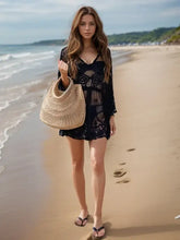 Black lace V-neck three-quarter sleeve cover up over swimsuit