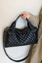 Large PU leather quilted handbag with structured shape and shoulder strap