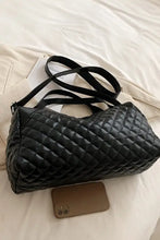 Large PU leather quilted duffel bag with top handles and strap