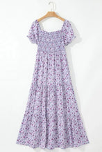 Lavender floral smocked summer dress with puff sleeves, square neckline, and tiered ruffled skirt