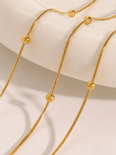 Layered beaded chain necklace in 18k gold-plated stainless steel