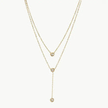 Gold-toned stainless steel layered necklace with bezel-set diamond pendants