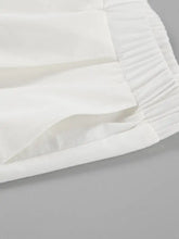 White pleated fabric detail of Layered Ruffled Cami and Pants Set