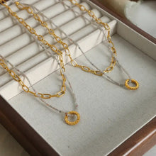 Layered titanium steel necklace with 18k gold-plated chain and beaded pendant