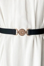 Black leather belt with gold rhinestone buckle and design