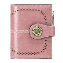 Pink faux leather bifold wallet with brass sunflower clasp