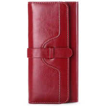 Red leather long wallet with flap closure and matching stitching