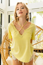 Lemon yellow short sleeve t-shirt with criss-cross V-neckline