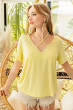 Lemon yellow short sleeve t-shirt with criss-cross V-neckline