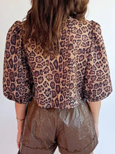 Leopard bow tie puff sleeve blouse in tan with dark brown spots featuring a cropped fit and puffed sleeves